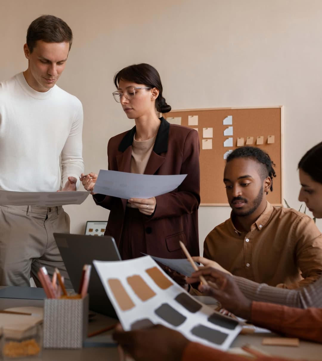 Collection of web designers working in an agency studio