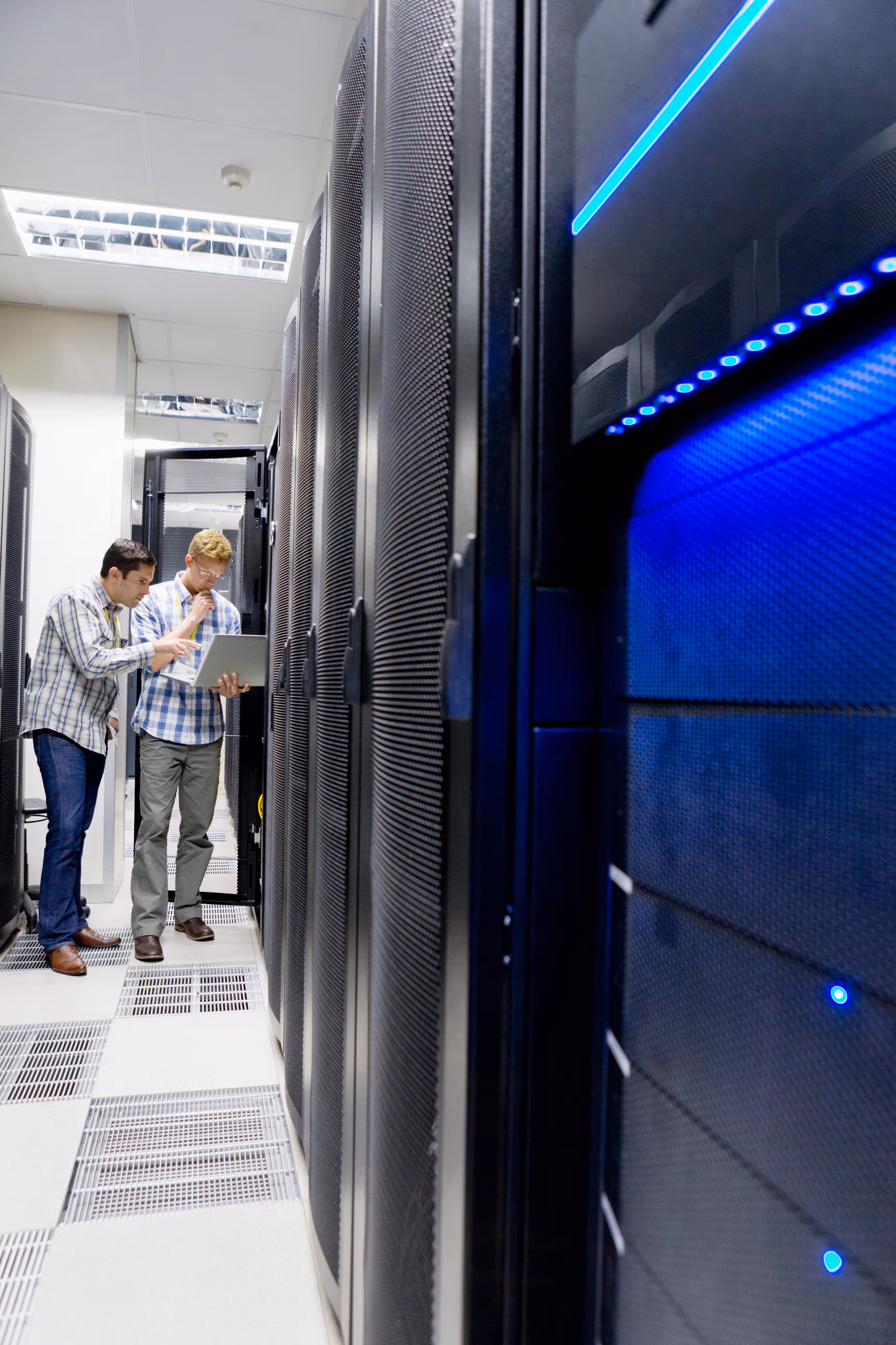 Technicians in a server room